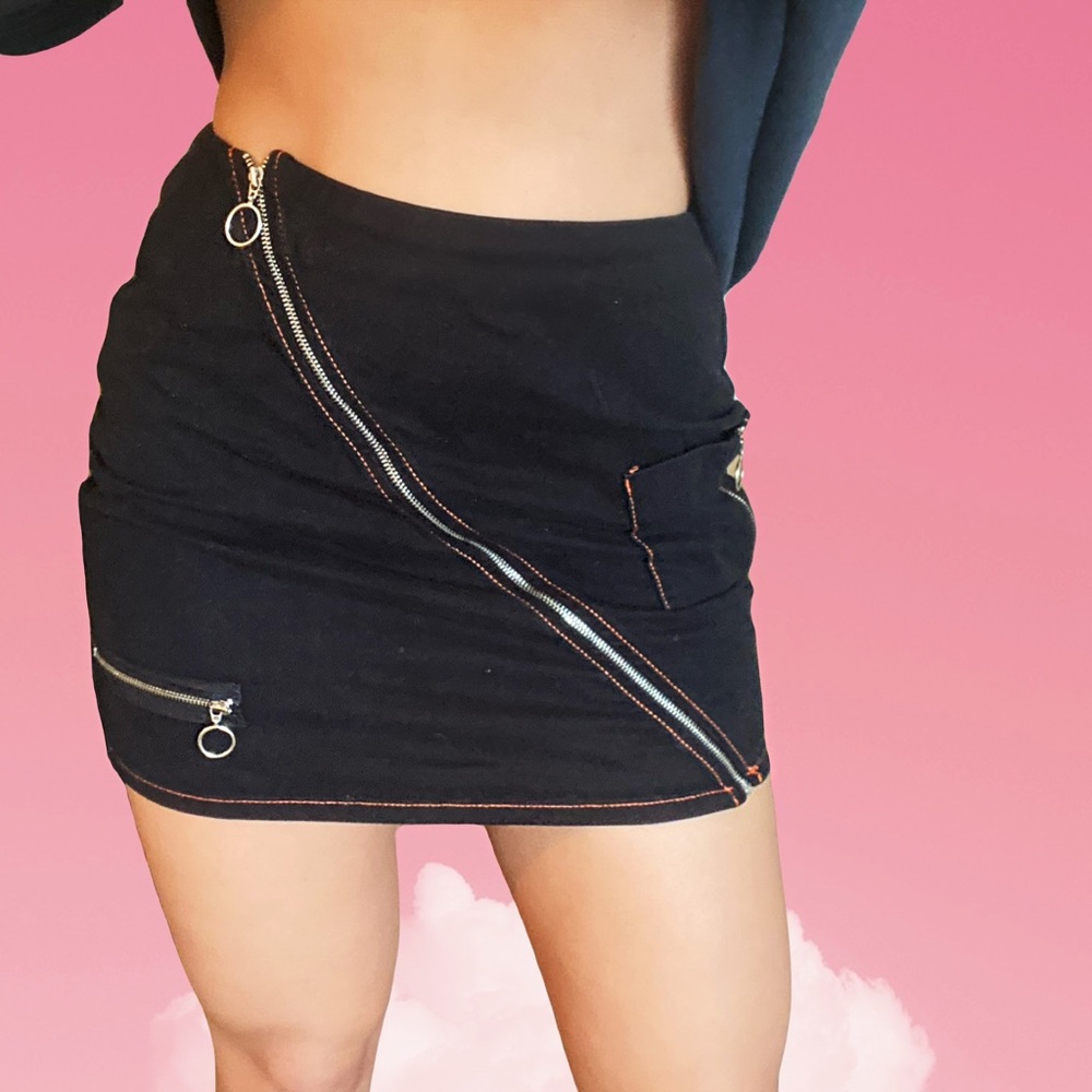 Zip up black mini skirt, never worn!